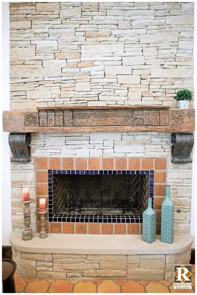 spanish style stone fireplace