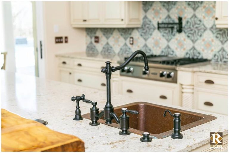 concrete tile with copper sink in spanish style kitchen