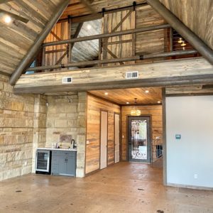 tobacco brown cantera stone tile in log home