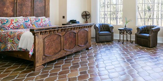 bedroom with manganese Saltillo tile flooring