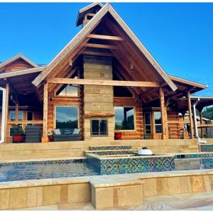 log cabin with cantera stone