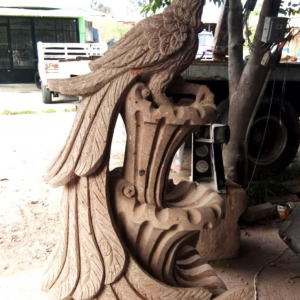 custom carved stone peacock